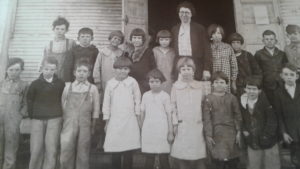 Necessity School. Vaudine Williams 6th from left, front row